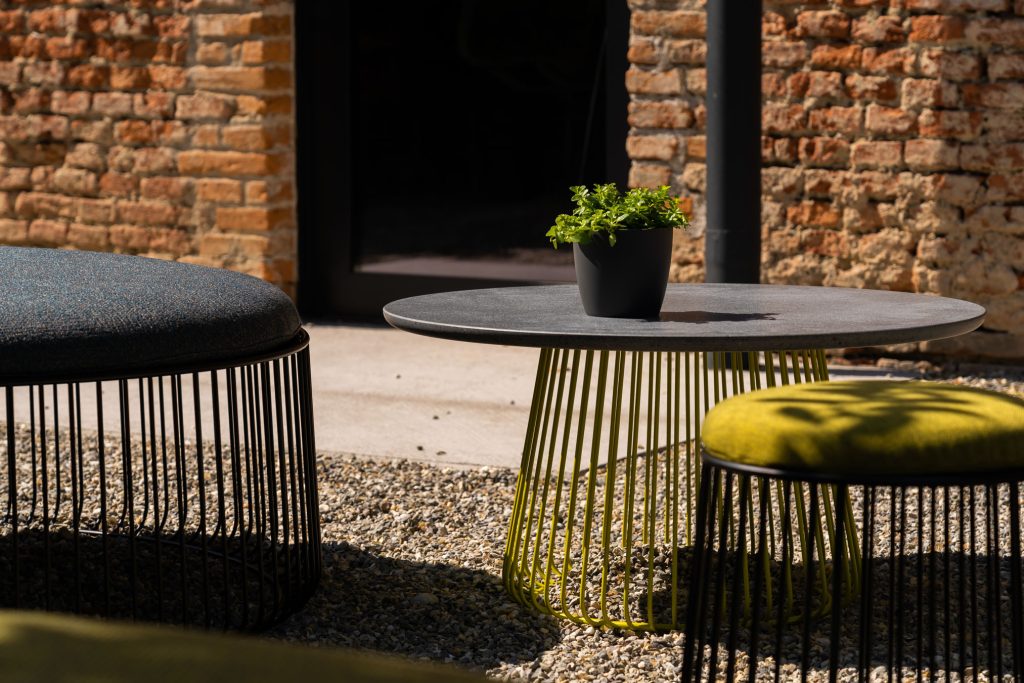 Carl coffee table and Bruce pouf from the SOUNDS - BertO Outdoor Furniture Collection